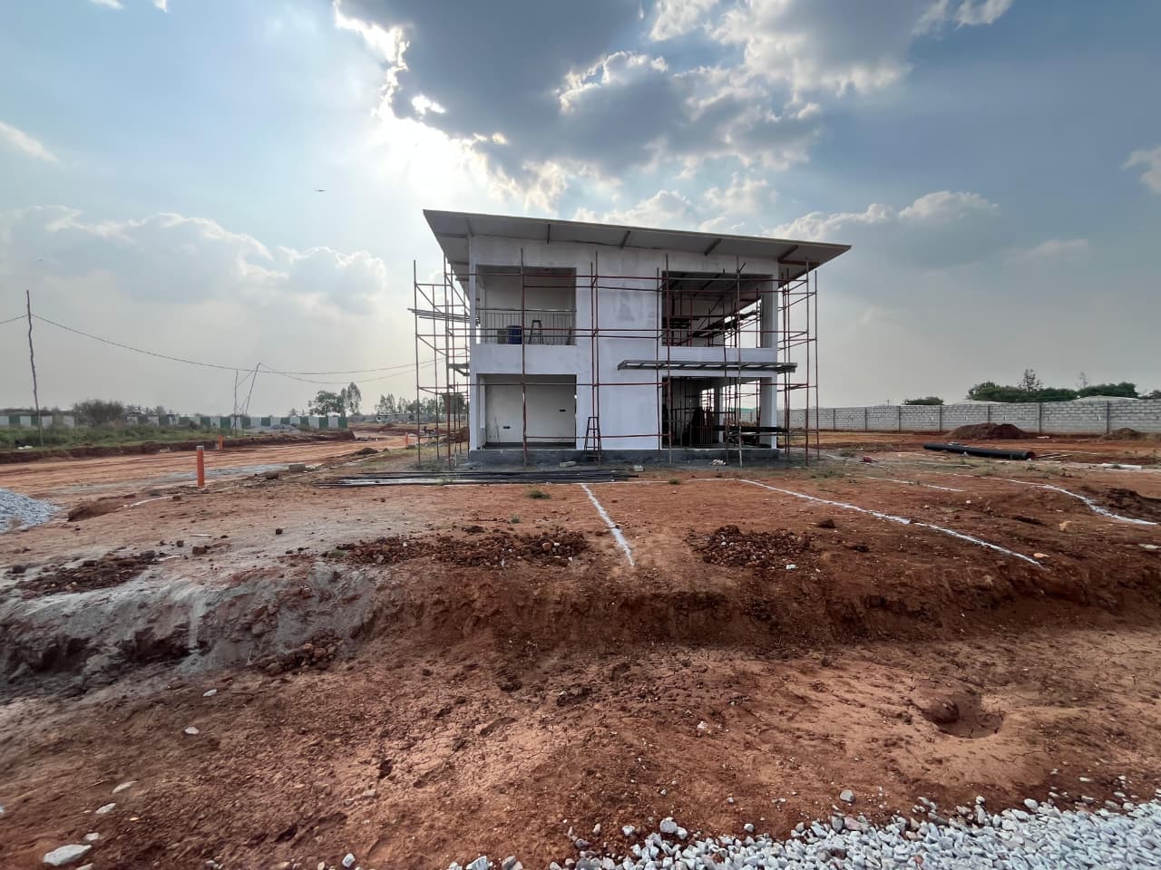 Whispering Greens By Earthern Projects site photograph 1